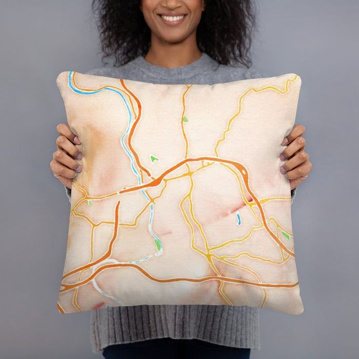 Person holding 18x18 Custom Asheville North Carolina Map Throw Pillow in Watercolor