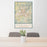 24x36 Asheville North Carolina Map Print Portrait Orientation in Woodblock Style Behind 2 Chairs Table and Potted Plant