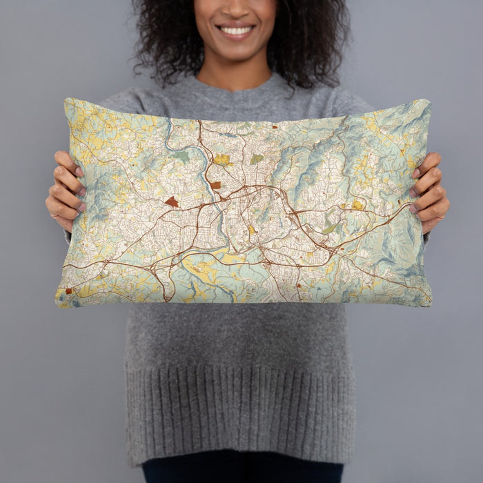 Person holding 20x12 Custom Asheville North Carolina Map Throw Pillow in Woodblock