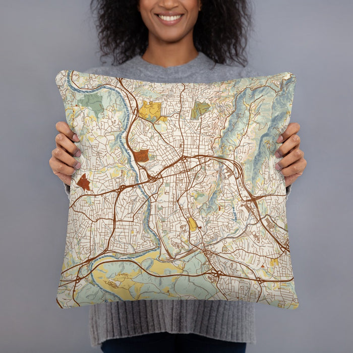 Person holding 18x18 Custom Asheville North Carolina Map Throw Pillow in Woodblock