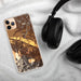 Custom Ashland Oregon Map Phone Case in Ember on Table with Black Headphones