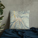 Custom Aspen Colorado Map Throw Pillow in Woodblock on Bedding Against Wall