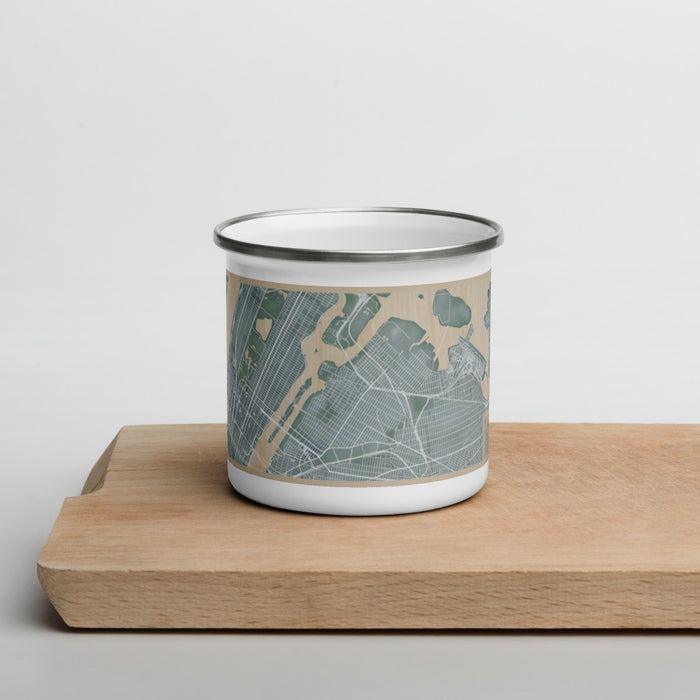 Front View Custom Astoria New York Map Enamel Mug in Afternoon on Cutting Board