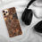 Custom Astoria New York Map Phone Case in Ember on Table with Black Headphones