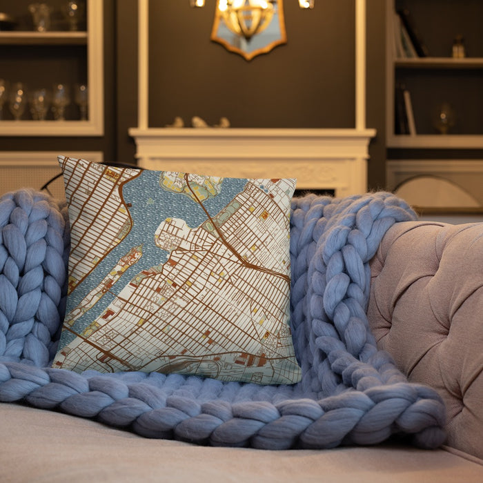 Custom Astoria New York Map Throw Pillow in Woodblock on Cream Colored Couch