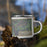 Right View Custom Atascadero California Map Enamel Mug in Afternoon on Grass With Trees in Background