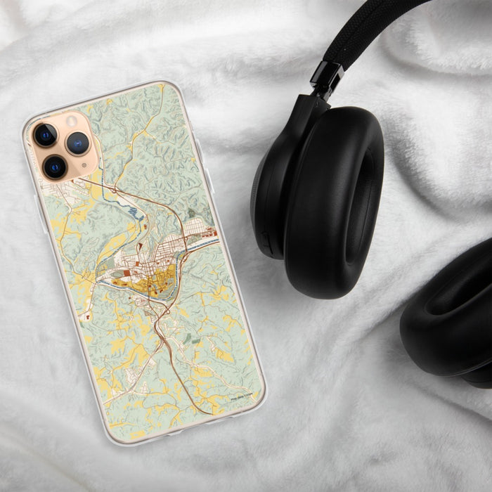 Custom Athens Ohio Map Phone Case in Woodblock on Table with Black Headphones