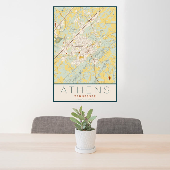 24x36 Athens Tennessee Map Print Portrait Orientation in Woodblock Style Behind 2 Chairs Table and Potted Plant