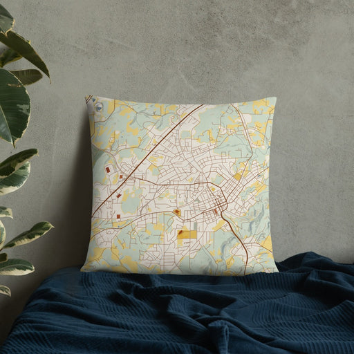 Custom Athens Tennessee Map Throw Pillow in Woodblock on Bedding Against Wall