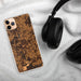 Custom Athens Texas Map Phone Case in Ember on Table with Black Headphones