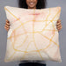 Person holding 22x22 Custom Athens Texas Map Throw Pillow in Watercolor