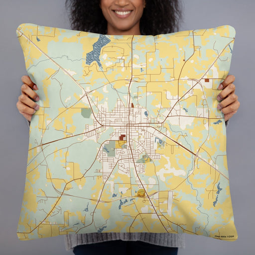 Person holding 22x22 Custom Athens Texas Map Throw Pillow in Woodblock
