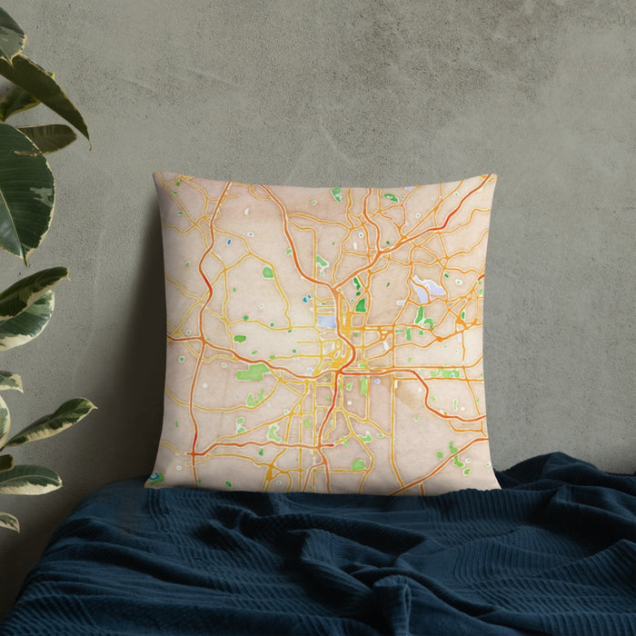 Custom Atlanta Georgia Map Throw Pillow in Watercolor on Bedding Against Wall