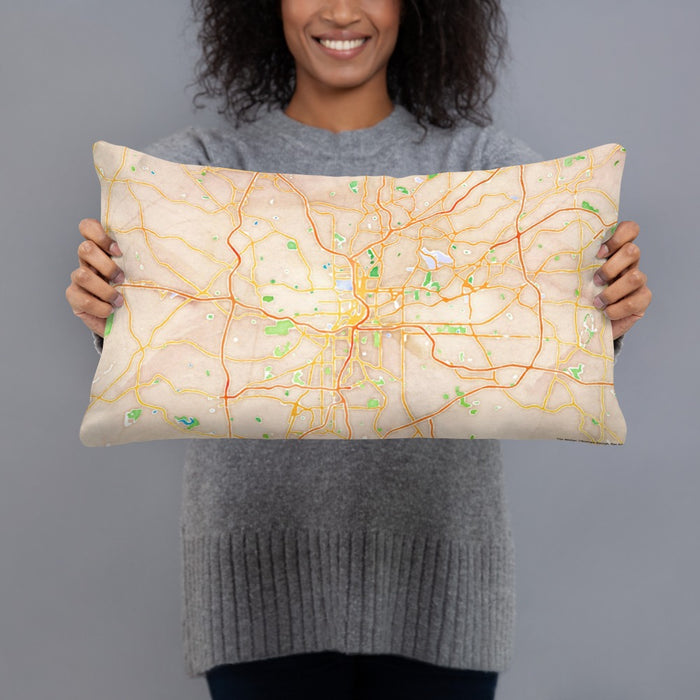 Person holding 20x12 Custom Atlanta Georgia Map Throw Pillow in Watercolor