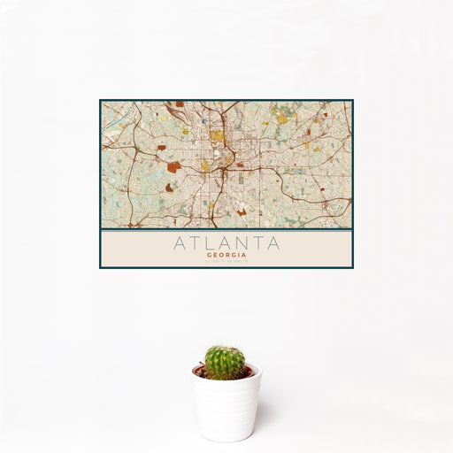 12x18 Atlanta Georgia Map Print Landscape Orientation in Woodblock Style With Small Cactus Plant in White Planter