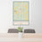24x36 Atlanta Texas Map Print Portrait Orientation in Woodblock Style Behind 2 Chairs Table and Potted Plant