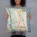 Person holding 18x18 Custom Atlantic Beach Florida Map Throw Pillow in Woodblock