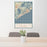 24x36 Atlantic City New Jersey Map Print Portrait Orientation in Woodblock Style Behind 2 Chairs Table and Potted Plant