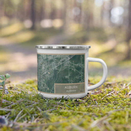Right View Custom Auburn Alabama Map Enamel Mug in Afternoon on Grass With Trees in Background