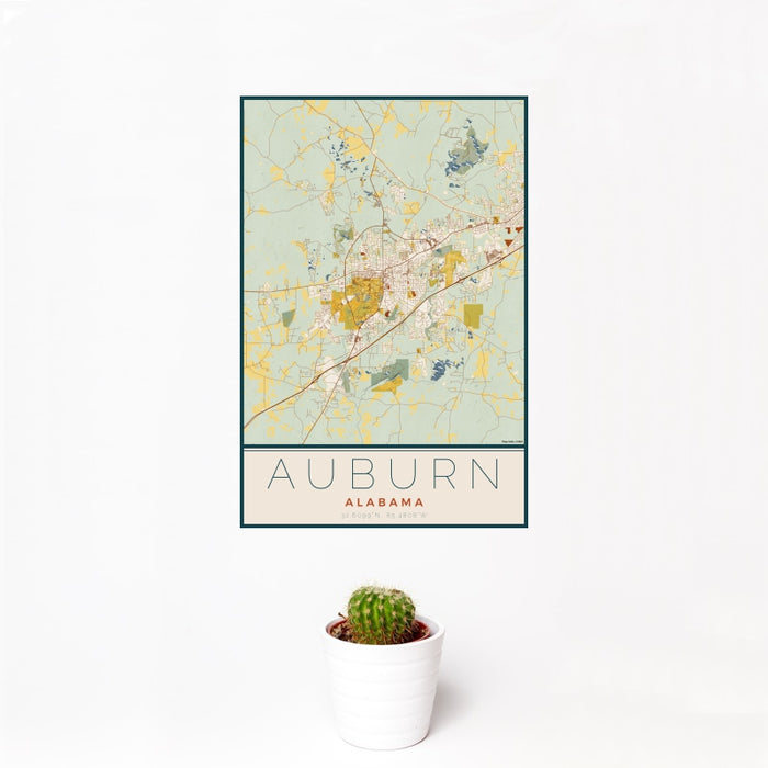 12x18 Auburn Alabama Map Print Portrait Orientation in Woodblock Style With Small Cactus Plant in White Planter