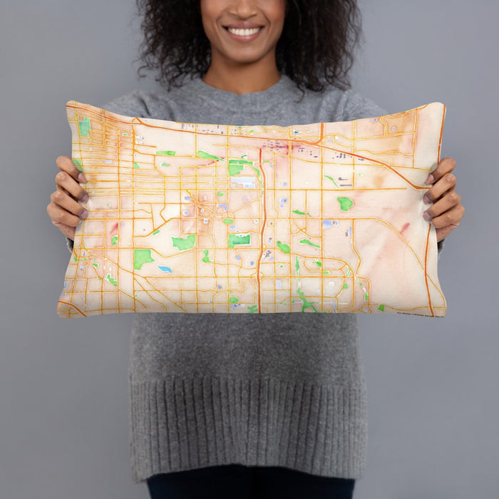 Person holding 20x12 Custom Aurora Colorado Map Throw Pillow in Watercolor