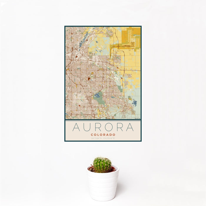 12x18 Aurora Colorado Map Print Portrait Orientation in Woodblock Style With Small Cactus Plant in White Planter