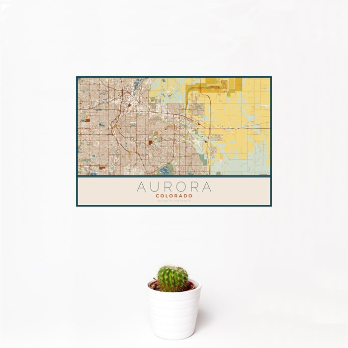 12x18 Aurora Colorado Map Print Landscape Orientation in Woodblock Style With Small Cactus Plant in White Planter