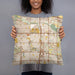Person holding 18x18 Custom Aurora Colorado Map Throw Pillow in Woodblock