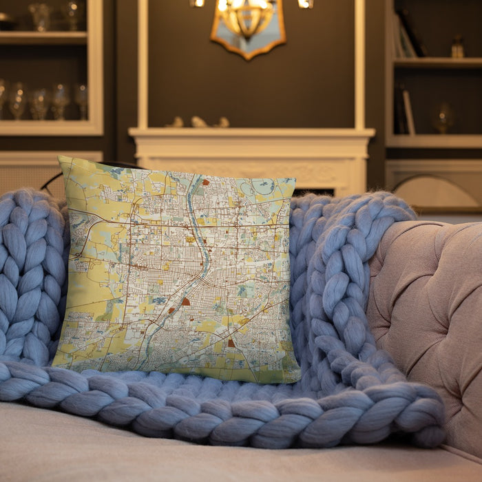 Custom Aurora Illinois Map Throw Pillow in Woodblock on Cream Colored Couch