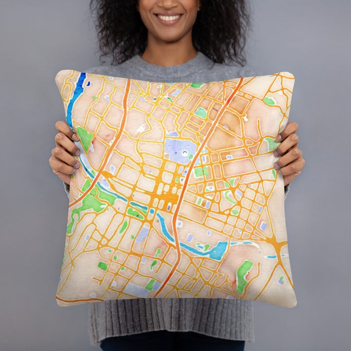 Person holding 18x18 Custom Austin Texas Map Throw Pillow in Watercolor