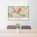 24x36 Austin Texas Map Print Landscape Orientation in Woodblock Style Behind 2 Chairs Table and Potted Plant