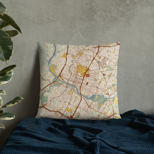 Custom Austin Texas Map Throw Pillow in Woodblock on Bedding Against Wall