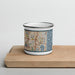 Front View Custom Aventura Florida Map Enamel Mug in Woodblock on Cutting Board