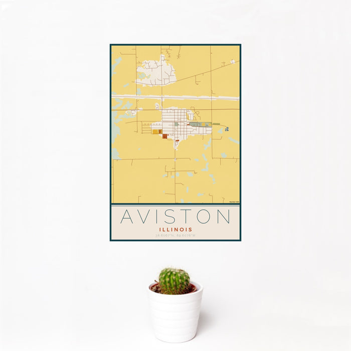 12x18 Aviston Illinois Map Print Portrait Orientation in Woodblock Style With Small Cactus Plant in White Planter