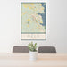 24x36 Azle Texas Map Print Portrait Orientation in Woodblock Style Behind 2 Chairs Table and Potted Plant
