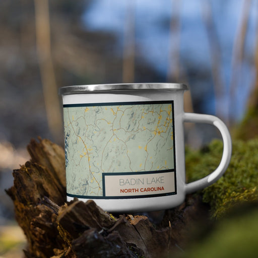 Right View Custom Badin Lake North Carolina Map Enamel Mug in Woodblock on Grass With Trees in Background