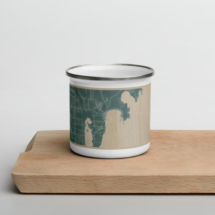 Front View Custom Baileys Harbor Wisconsin Map Enamel Mug in Afternoon on Cutting Board