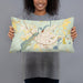 Person holding 20x12 Custom Bainbridge Georgia Map Throw Pillow in Woodblock