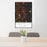 24x36 Bainbridge Island Washington Map Print Portrait Orientation in Ember Style Behind 2 Chairs Table and Potted Plant