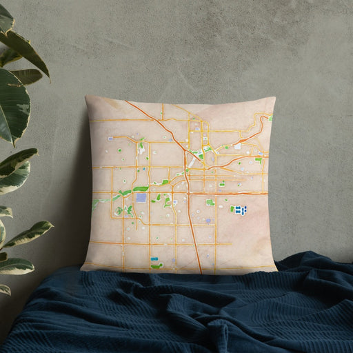 Custom Bakersfield California Map Throw Pillow in Watercolor on Bedding Against Wall