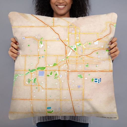 Person holding 22x22 Custom Bakersfield California Map Throw Pillow in Watercolor