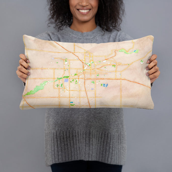 Person holding 20x12 Custom Bakersfield California Map Throw Pillow in Watercolor