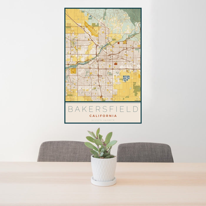 24x36 Bakersfield California Map Print Portrait Orientation in Woodblock Style Behind 2 Chairs Table and Potted Plant