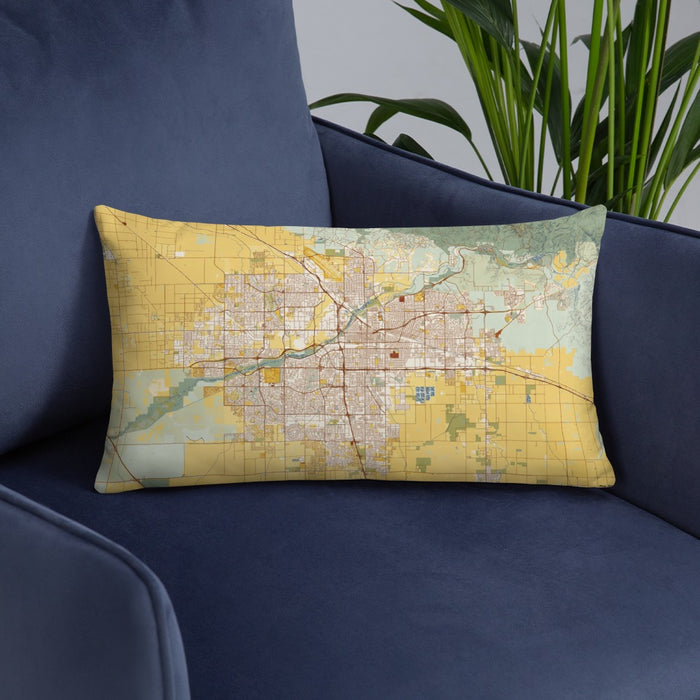 Custom Bakersfield California Map Throw Pillow in Woodblock on Blue Colored Chair