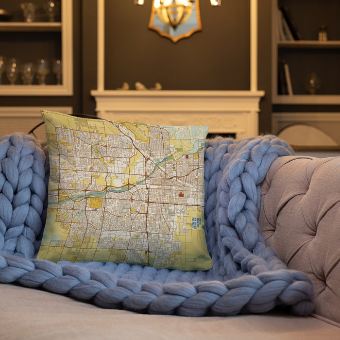 Custom Bakersfield California Map Throw Pillow in Woodblock on Cream Colored Couch