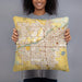 Person holding 18x18 Custom Bakersfield California Map Throw Pillow in Woodblock