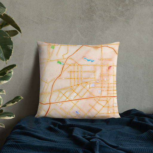 Custom Baldwin Park California Map Throw Pillow in Watercolor on Bedding Against Wall