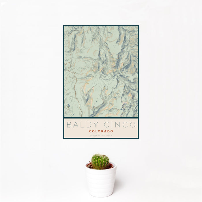 12x18 Baldy Cinco Colorado Map Print Portrait Orientation in Woodblock Style With Small Cactus Plant in White Planter