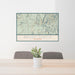 24x36 Baldy Cinco Colorado Map Print Lanscape Orientation in Woodblock Style Behind 2 Chairs Table and Potted Plant