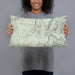 Person holding 20x12 Custom Baldy Cinco Colorado Map Throw Pillow in Woodblock